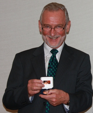 Sir John Lawton with the Sir John Burnett memorial medal