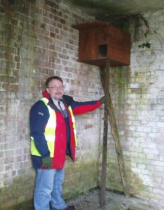 Phil Thomas with one of the many Barn owl boxes monitored across the MoJ estate