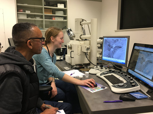Jas and Sophie training to use the Scanning Electron Microscope