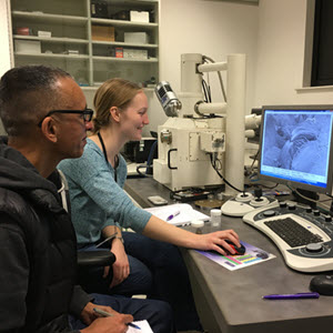 Jas and Sophie training to use the Scanning Electron Microscope