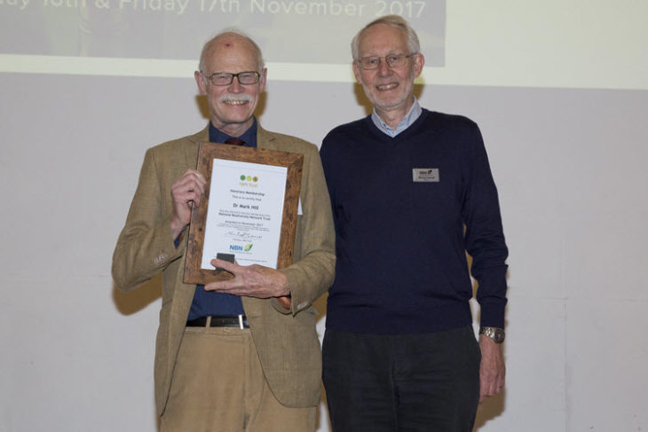 Mark Hill receiving Honorary Membership from Michael Hassell