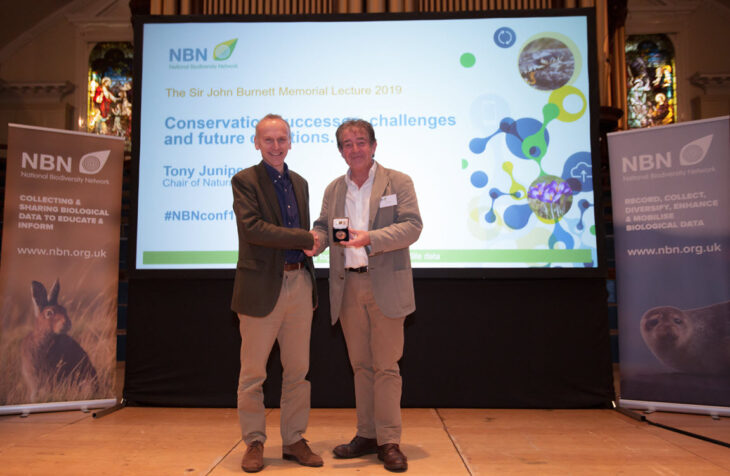 Neil Hodges presenting Tony Juniper with the Sir John Burnett Memorial Medal