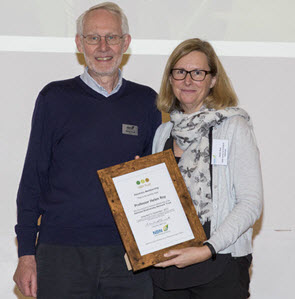 Helen Roy receiving Honorary Membership of the NBN Trust from Michael Hassell