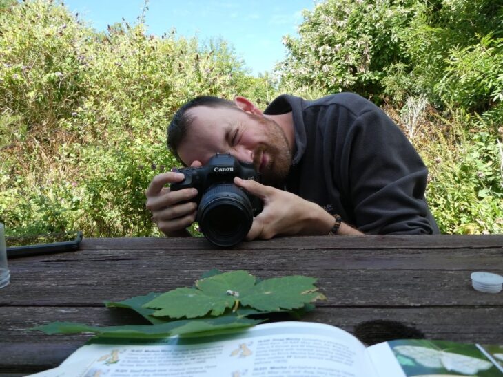 Derbyshire Moth Verification and Recording Team member Will Soar, photographing and recording in the field.jpg